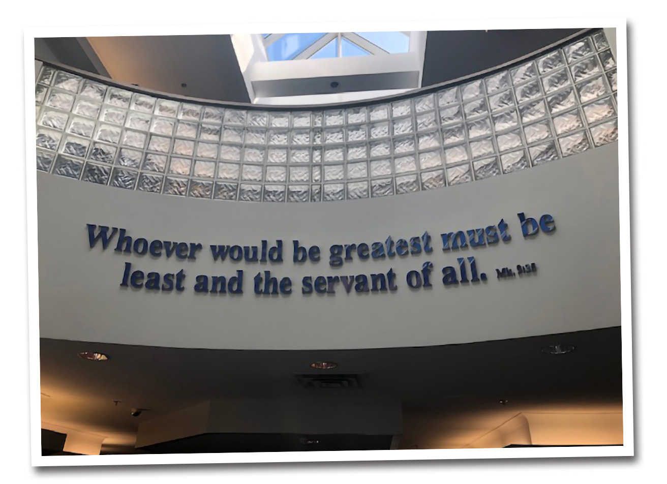 Wall sign with bible verse.