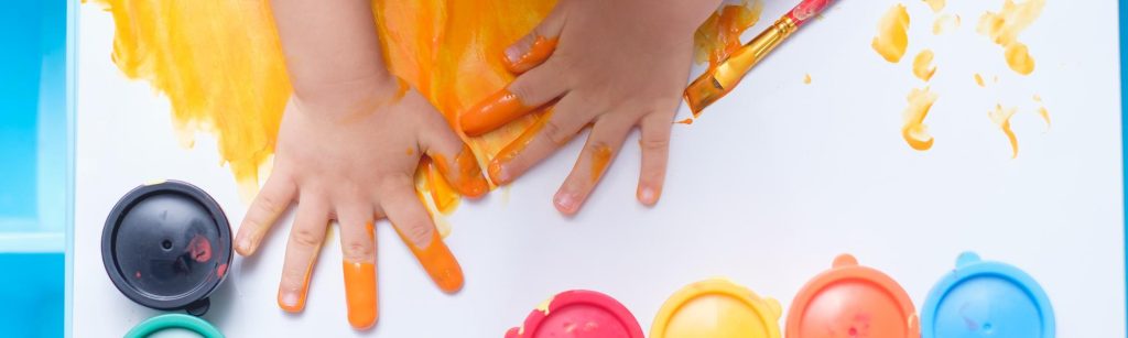 Child finger painting