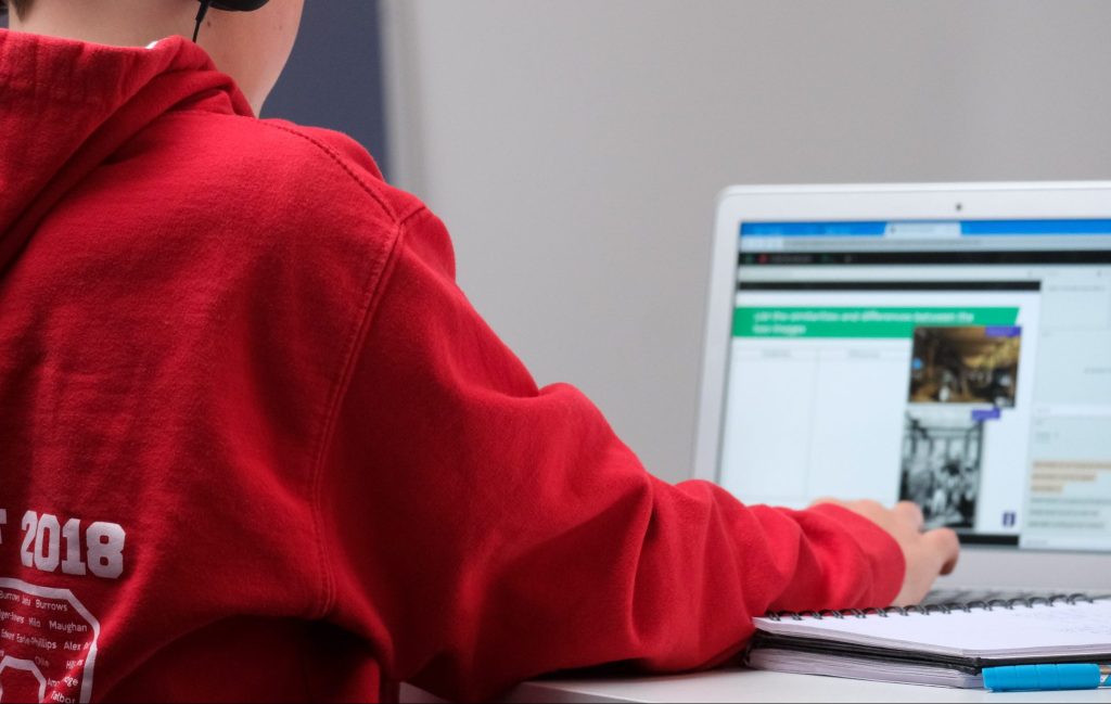 Boy doing online school