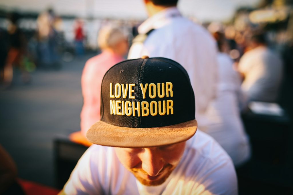 This is Max wearing a cap from LOVE YOUR NEIGHBOUR.
